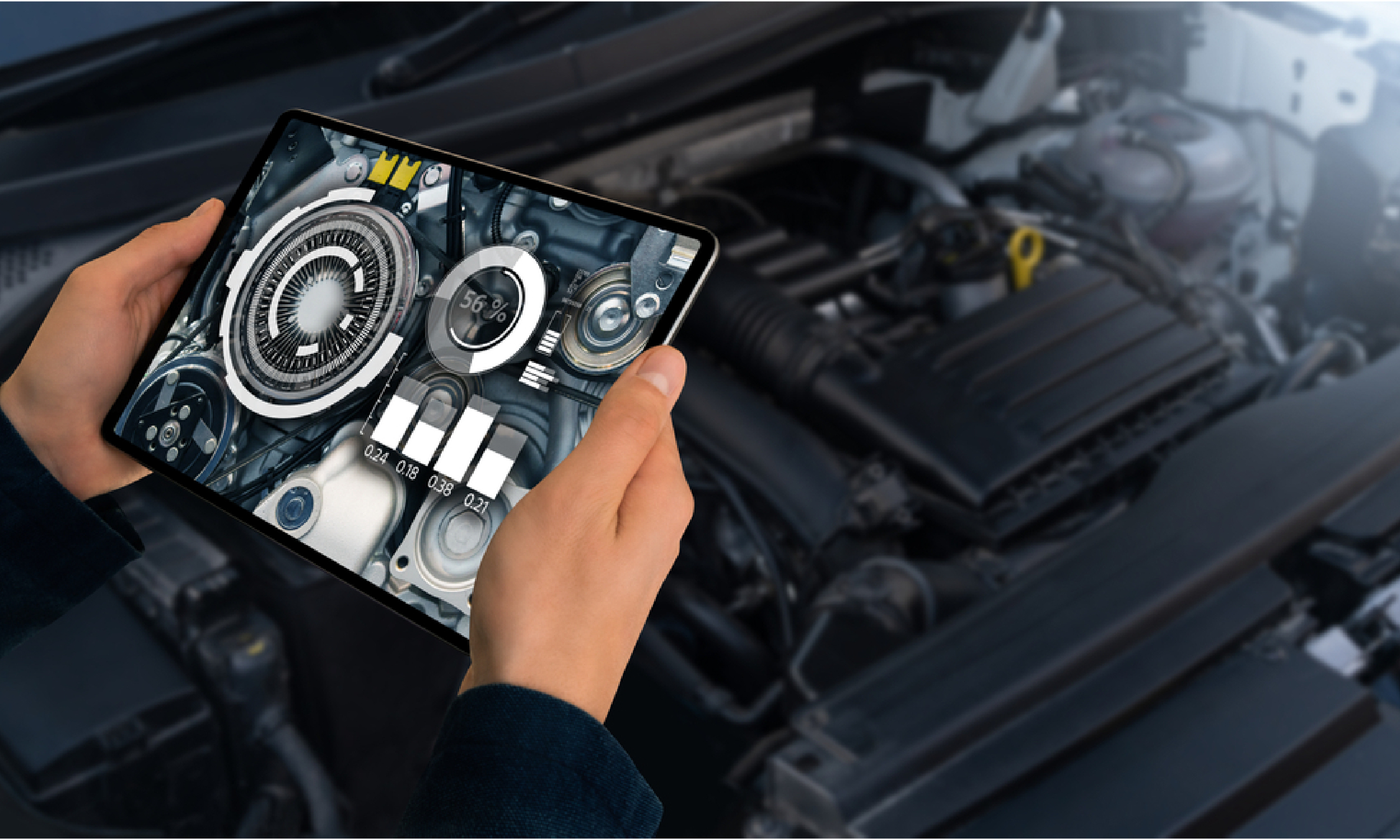 Technician inspecting underbody on lift